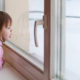 Child Looking out Window