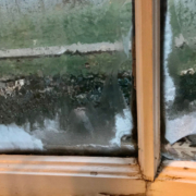 icy condensation inside an old window