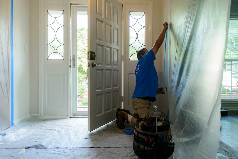 Our team takes the time to cover surfaces in your home with plastic sheeting to keep the work area contained