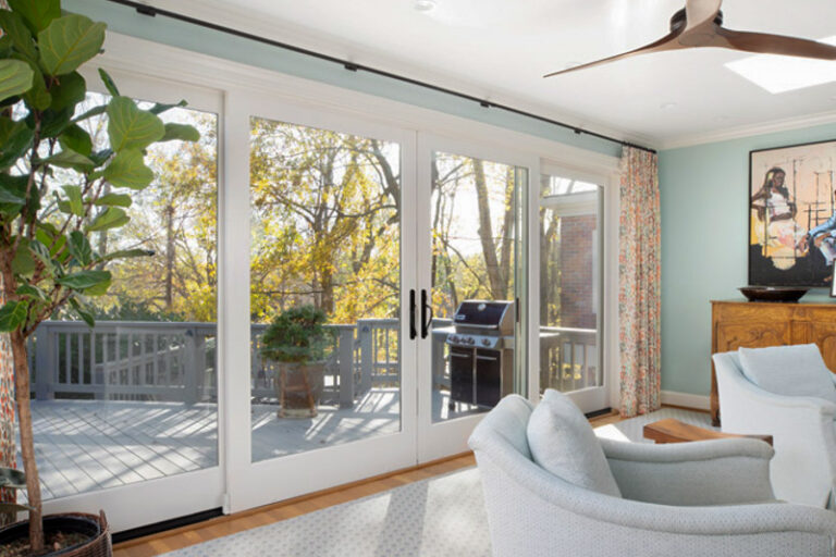 Inside view of patio door overlooking sunny deck