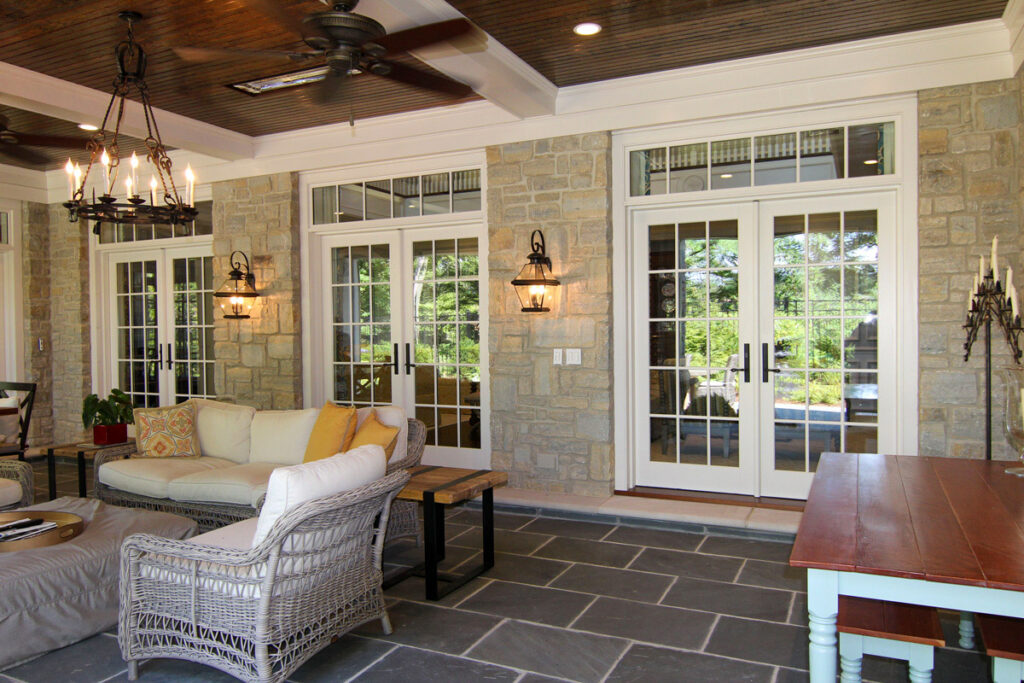 How To Choose A Patio Door 7 Stone patio with 3 sets of french doors leading into a house