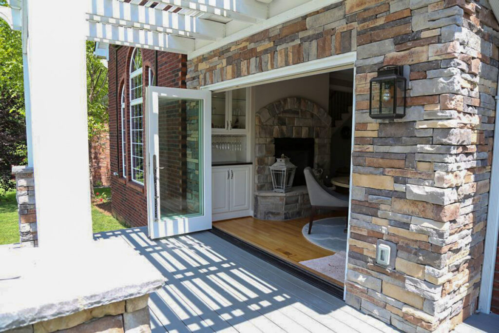 How To Choose A Patio Door 10 Bi-fold door leading to a patio